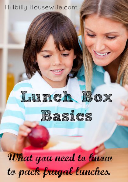 Mother and son packing a healthy , frugal lunch 