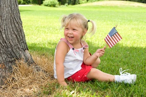 Little girl having funon the 4th of July 