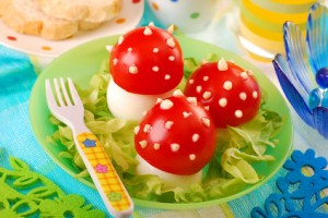 Toadstools made from hard boiled eggs, tomato and mayonnaise