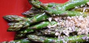 steamed asparagus topped with pine nuts. 