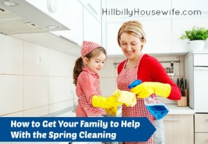 Mother and daughter cleaning in the kitchen