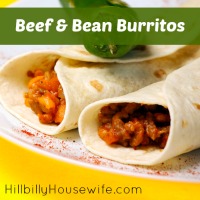 Two burritos made with ground beef, refried beans and cheese.