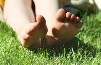 feet in grass