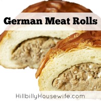 Two Bierrocks or german meat rolls filled with cooked cabbage and ground beef.
