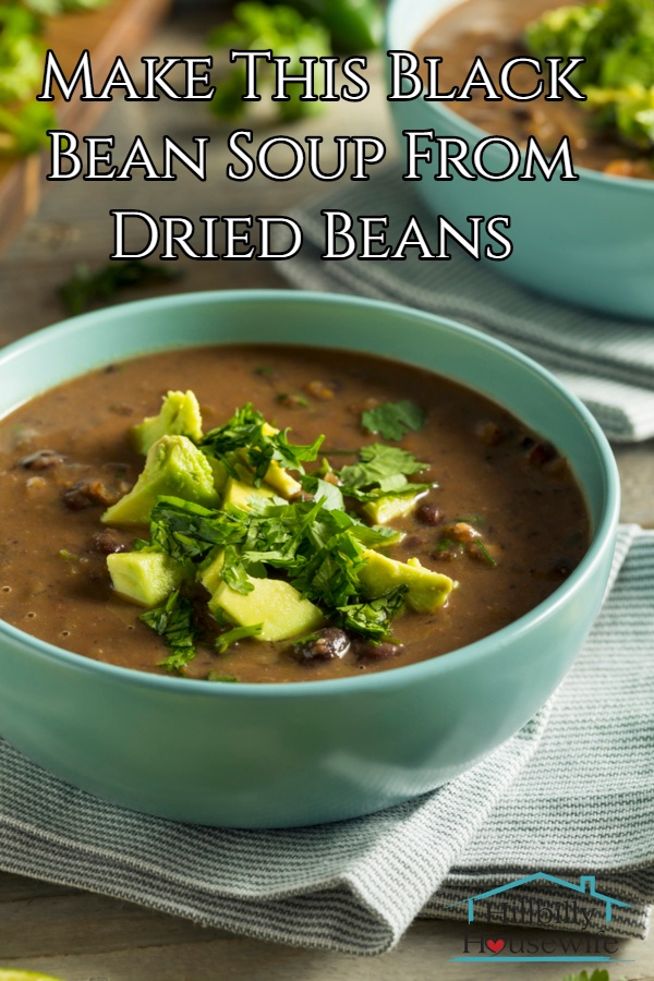 Black bean soup made from dried beans topped with avocado