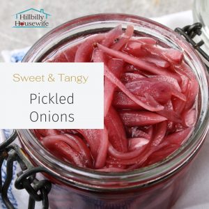 An open jar of pickled red onions. 